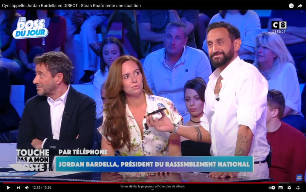 Le 13 juin 2024, deux semaines avant le premier tour des élections législatives, sur le plateau de Touche pas à mon poste sur C8, Cyril Hanouna appelle en direct Jordan Bardella pour organiser un rapprochement avec Sarah Knafo (Reconquête !).Touche pas à mon poste ! / D.R.